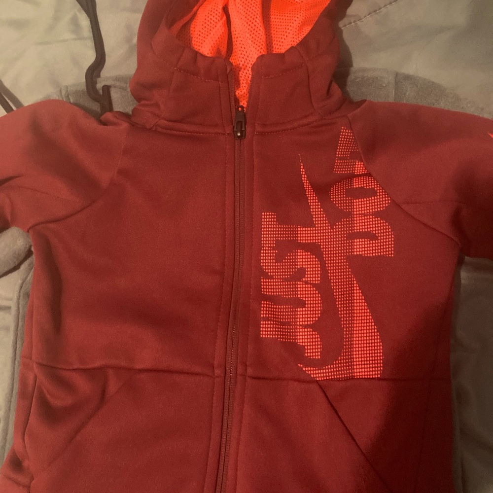 Boys Nike jacket! size 2T, primary color maroon. Nice jacket for your lil man!